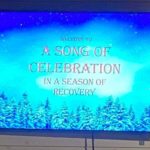 TV screen airing Song of Celebration